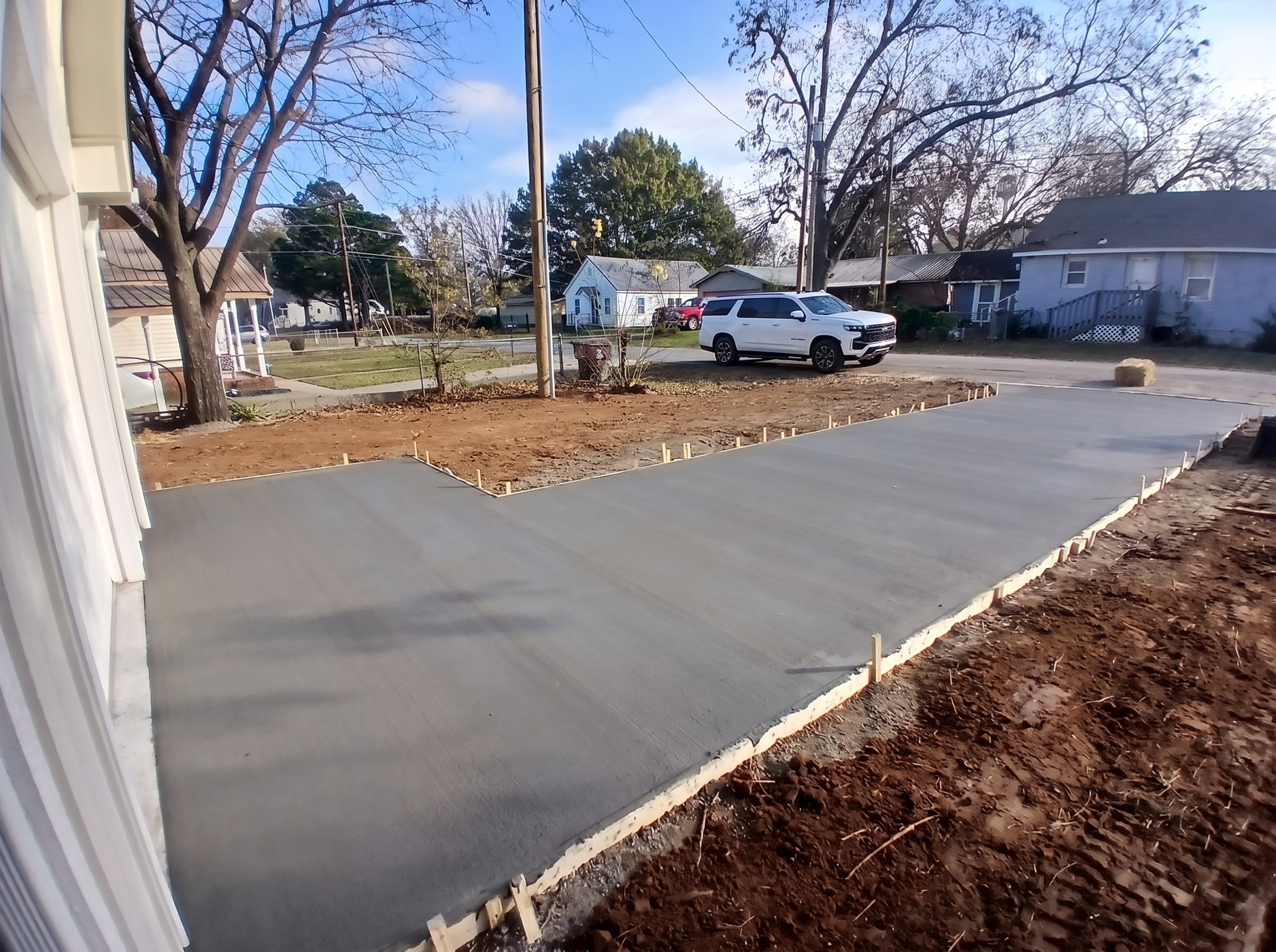 Fresh concrete driveway with forms in place