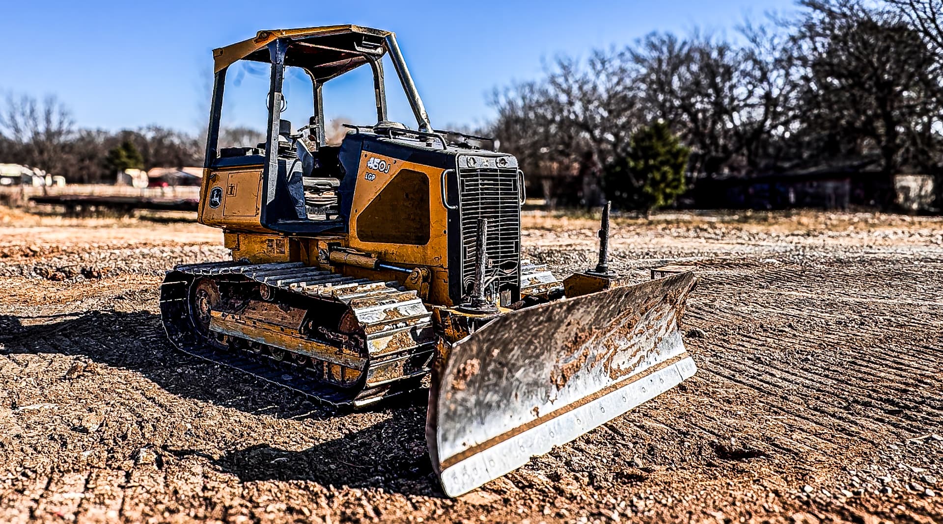 John Deere 450J LGP dozer and blade at Readyline